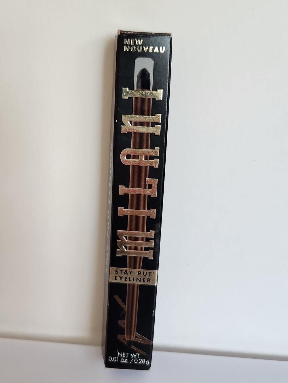 #02 Semi-sweet Milani Stay Put Eyeliner, a long-wearing mechanical pencil